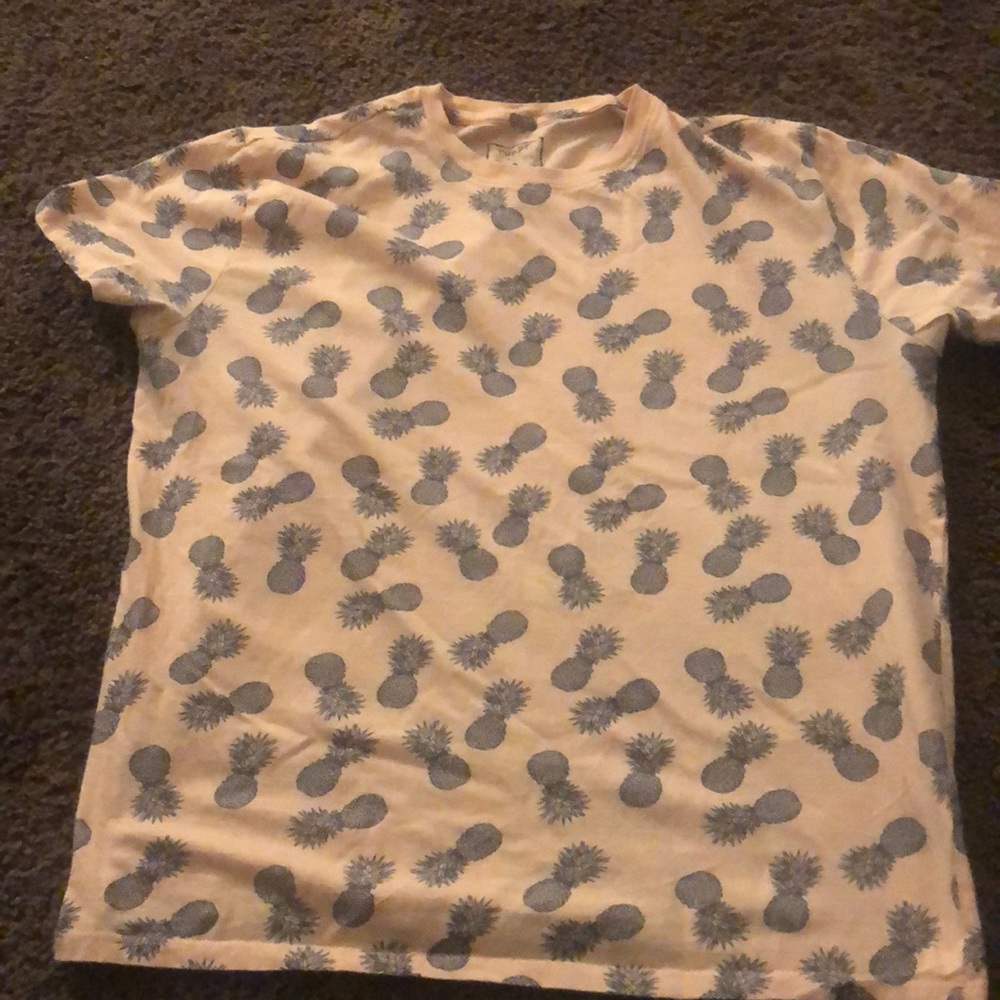 Peach shirt with navy blue pineapples